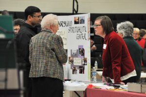 Franciscan Sisters of Perpetual Adoration Marianna Ableidinger, middle, and Julia Walsh, right, chat with Fr. Madanu Lourdu Raju, left, parochial administrator of parishes in Gilman, Jump River, Sheldon and Lublin, Oct. 28, at Fall Conference. Sr. Julia recently joined the staff of the Marywood Spirituality Center, Arbor Vitae. (Catholic Herald photo by Anita Draper)